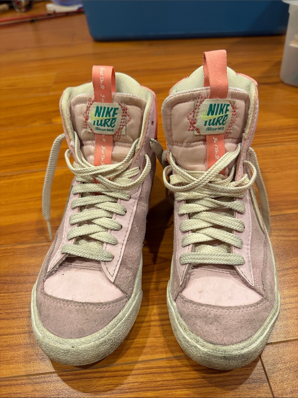 Nike pink and cream high-top suede sneakers